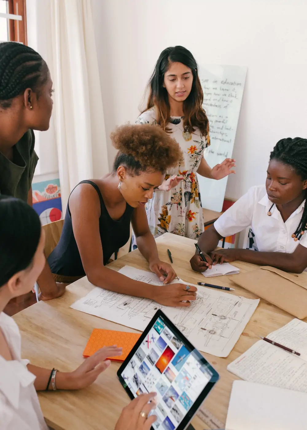 Diverse team working at table